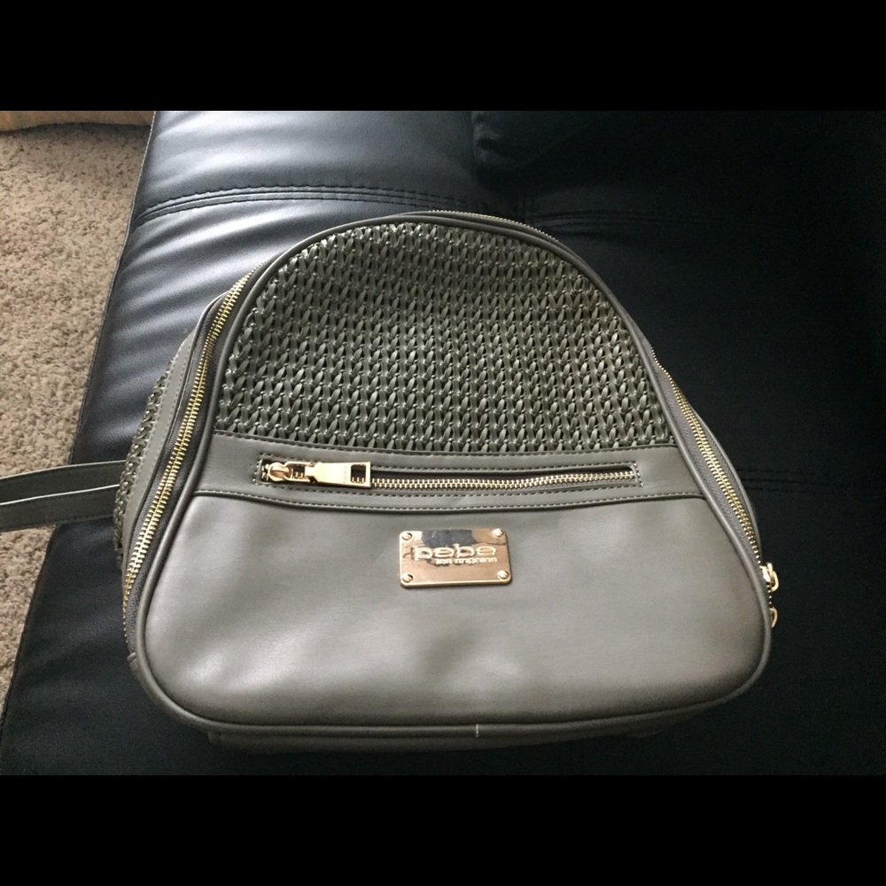Olive green Bebe purse backpack. Great condition